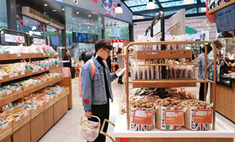 告別快遞哥 良品鋪?zhàn)娱T店可以喝著下午茶取包裹